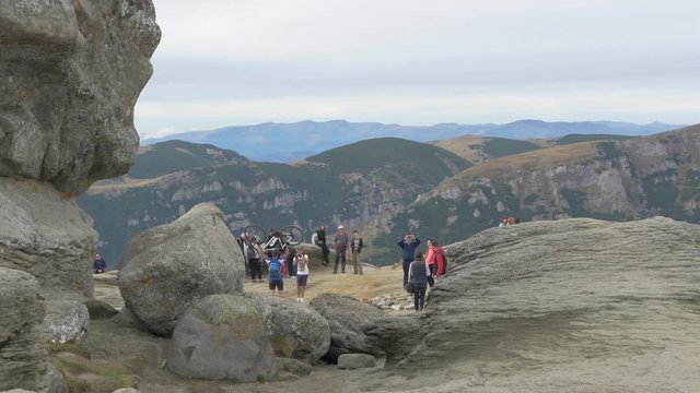 People next to the Sphinx, Bucegi Mountains 