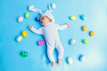 bunny surrounded by eggs