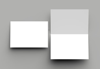 Bi fold vertical - landscape brochure or invitation mock up isolated on gray background.