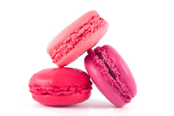 Obraz na płótnie Canvas composition of three raspberry, tasty biscuit cakes on white background closeup
