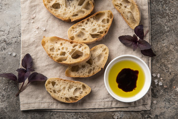 Fototapeta premium homemade italian ciabatta bread with olive oil and balsamic sauce