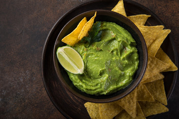 guacamole (mexican avocado dip) with nachos,