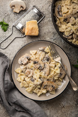 farfalle pasta with champignon mushrooms and garlic creamy sauce