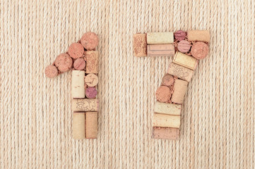 Number  seventeen 17 made of wine corks on jute rope background