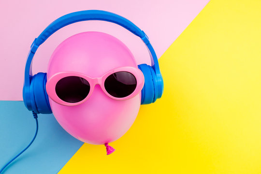 pink air balloon on colorful background, Bright Summer Color, Tropical Fruit with Sunglasses, Creative Art concept. Minimal style,Hot Beach Vibes. Fun Party Mood