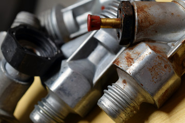 Used valves of airless paint sprayer close up