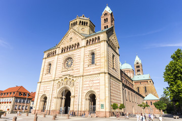 Fototapeta na wymiar Speyer, Germany. West facade of the Imperial Cathedral Basilica of the Assumption and Saint Stephen. A World Heritage Site since 1981 and largest romanesque cathedral in the world