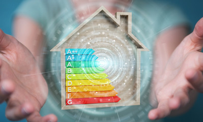 Businesswoman using 3D rendering energy rating chart in a wooden house