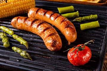 grilled krakauer with french fries and green salad