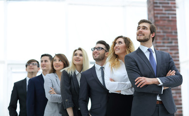 successful business team looking at copy space.