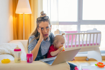 Exhausted woman with little child