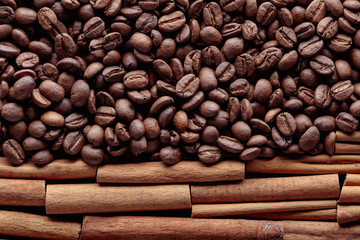 Cinnamon sticks and coffee beans .