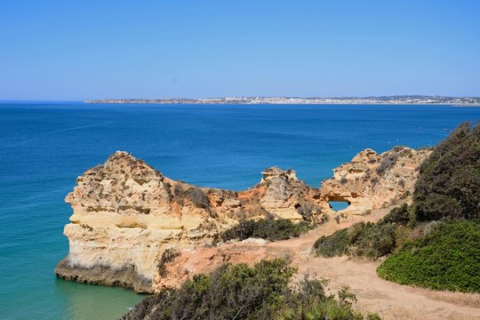 Elevated view of the rugged coastline, Praia da Rocha, Portimao, Portugal.