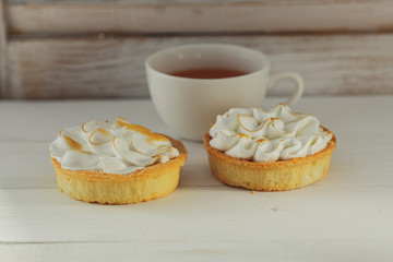 meringue cake, meringue on a white table assorted