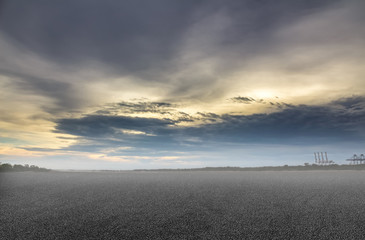 Asphalt road and sky industry background