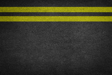 Double Yellow Line On New Asphalt Road texture background