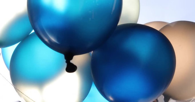 blue and white balloon floating swivel decoration in birthday anniversary celebration party