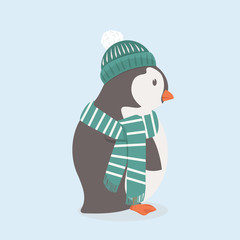 Cute penguin with green hat and scarf