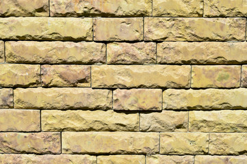 Natural texture of a large light yellow brick.Background.