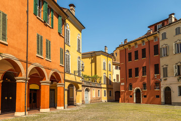 Typical colourful streets and houses of Modena city Tuscany, Italy.