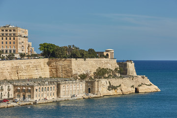 Fototapeta na wymiar View of a coast and downtown of Valletta in Malta