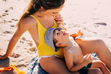 Mother and son on beach