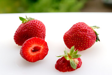 Strawberries on a white board