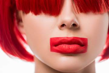 Fototapeta premium cropped image of woman with red hair and red lips in shape of rectangle isolated on white