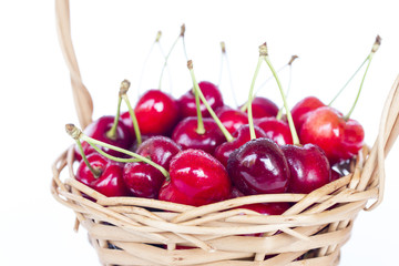 fresh cherries in a wicker basket