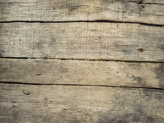 Fototapeta premium rustic weathered barn wood background with knots and nail holes