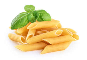 Penne rigate pasta and basil isolated on white background. Raw.