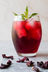 Cold Brew Hibiscus Tea with ice and Mint Leaves.
