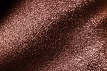 Brown leather material as an abstract background