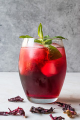 Cold Brew Hibiscus Tea with ice and Mint Leaves.
