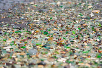 Glass beach, colorful polished sea glass, ceramics