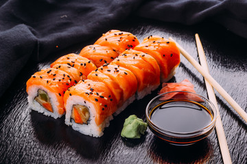 Roll sushi with salmon, prawn, avocado, cream cheese. Sushi menu. Japanese food. © nehopelon