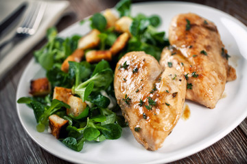 Grilled chicken breast with salad