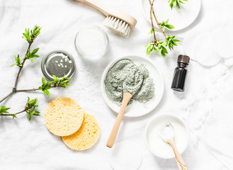 Dead sea mud mask - beauty products ingredients on light background, top view. Beauty concept. Flat lay