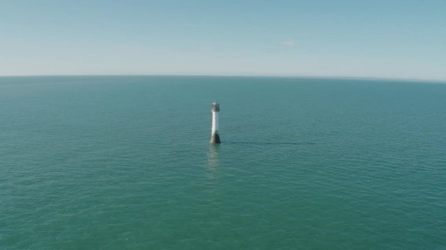 Aerial drone shot of Bell Rock Lighthouse near the coast of Arbroath