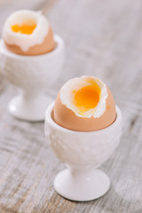delicious breakfast with boiled eggs and crispy toasts, horizontal, closeup