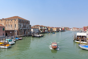 Fototapeta na wymiar vaporetto, a venetian water taxi on the canal in Venice