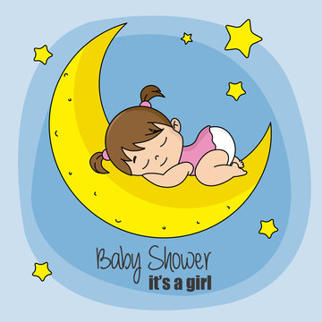 baby girl sleeping on top of the moon