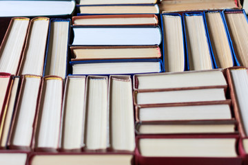 Stacked old books background