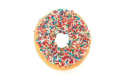 Donut with colorful sprinkles isolated on white background