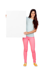 Brunette girl with pink pants holding a blank poster