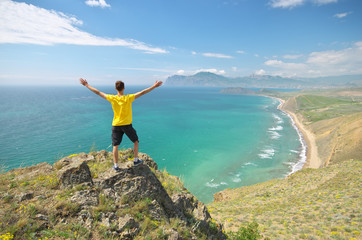 Man and sea mountain landscape.