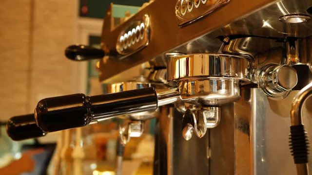 automatic coffee machine dispenser in cafe