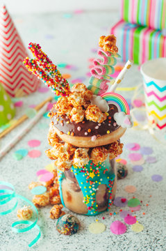 Chocolate freak shake with donut on the party table