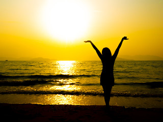 silhouette  style of a people at a sea side