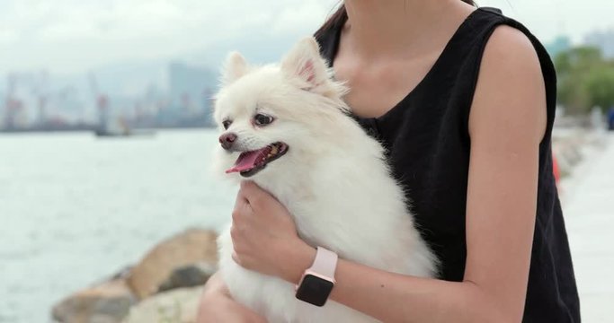Woman with her dog at outdoor